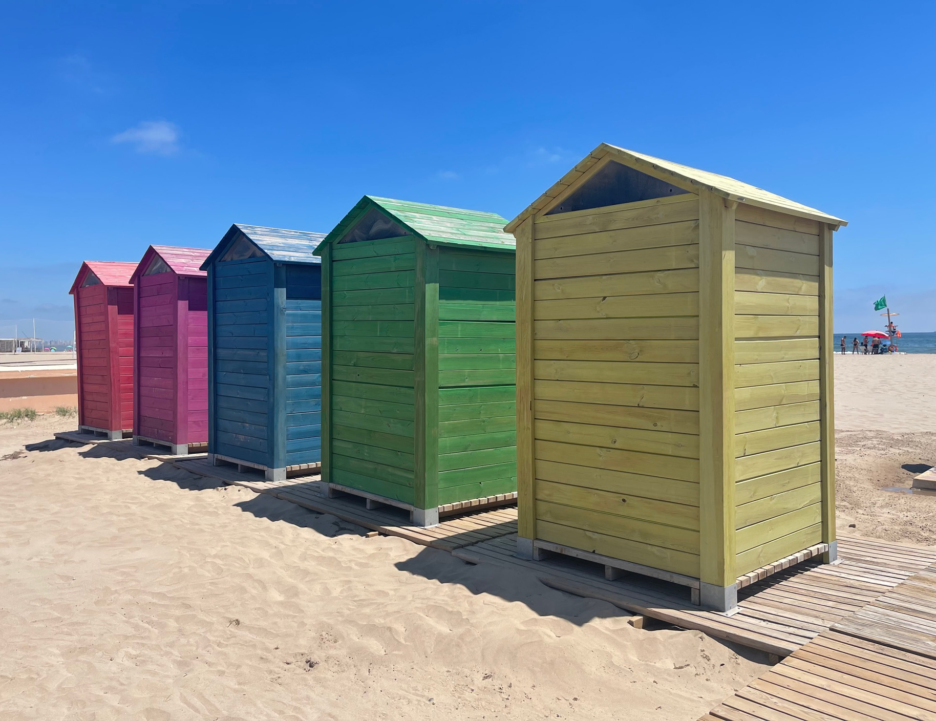 Coloured beach huts on Malvarosa beach